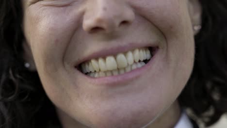 Cropped-shot-of-beautiful-female-face-with-toothy-smile